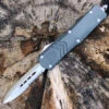 CobraTec Gray FS-X OTF Knife CTKMGRYFS-XMDAG1SS, 3" D2 Steel Dagger Serrated Blade, Gray Aluminum Handle 2 CobraTec Gray FS-X OTF Knife CTKMGRYFS-XMDAG1SS, 3" D2 Steel Dagger Serrated Blade, Gray Aluminum Handle -Knife Sale Store MGYFS XMDAG1SS.1 60848.1583253433